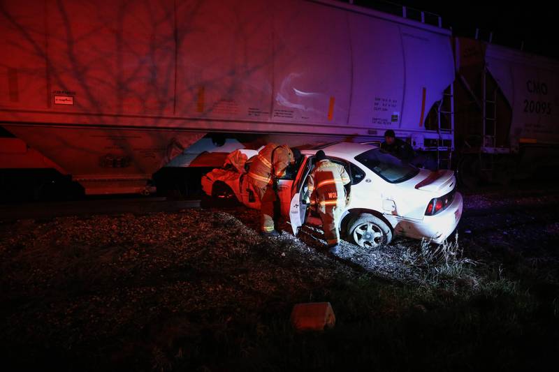 A vehicle crashed into a train Wednesday night, April 27, 2022, in Harvard, but the driver was not found despite an "extensive search," officials said.