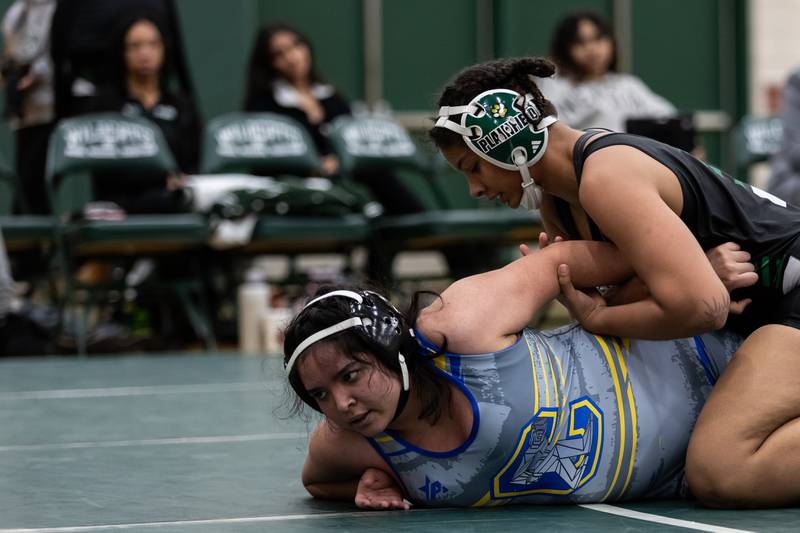 Plainfield Central's Alicia Tucker takes on Gianna Guerroro of Joliet Central in the 170-pound match at Plainfield Central on January 13, 2025.