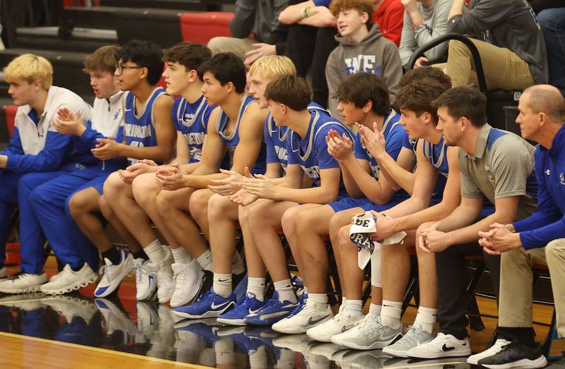 Members of the Princeton boys basketball team watch the Tigers play Eureka during the Colmone Classic on Thursday, Dec. 11, 2025 at Hall High School.