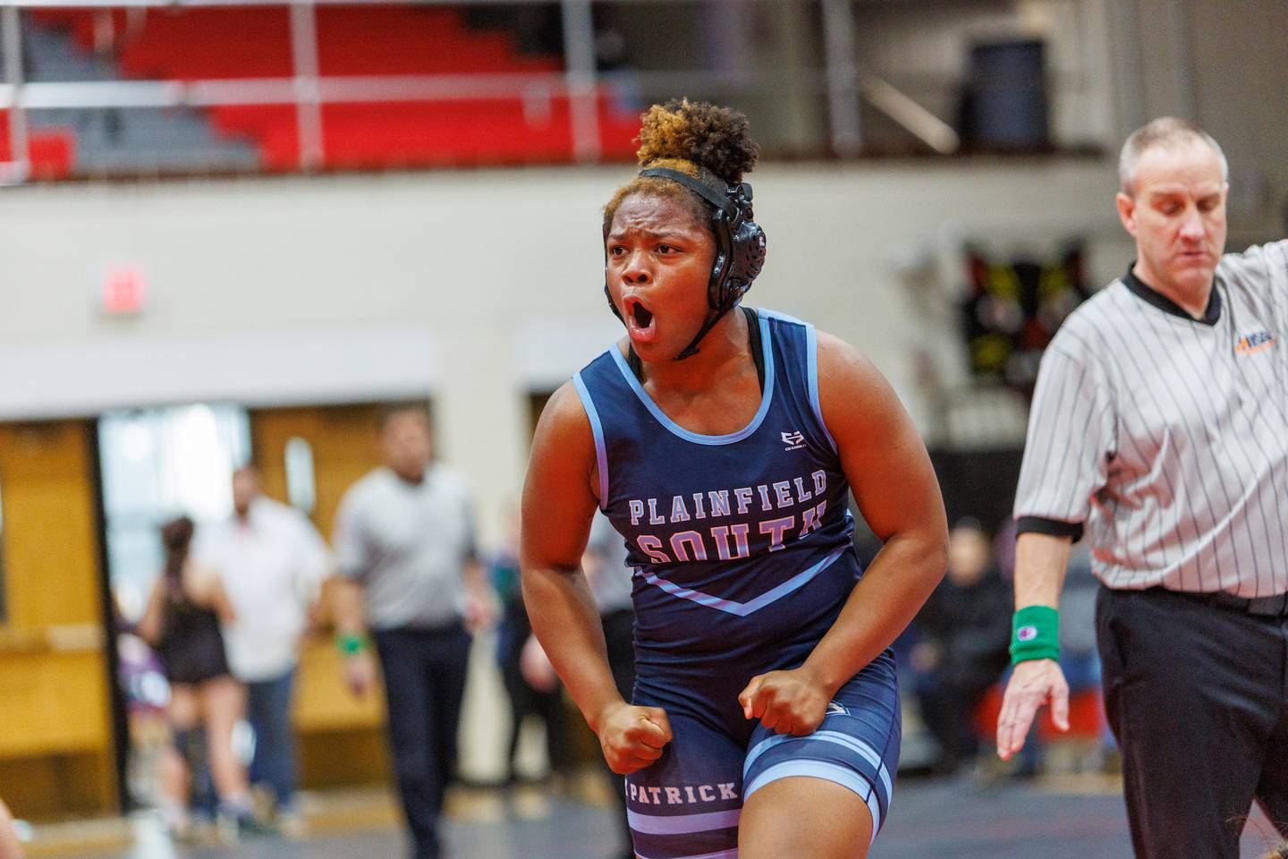 Plainfield South's Kimyra Patrick celebrates winning the championship 190 lb class at the East Aurora Wrestling Regional on Saturday, Feb.7,2026 in Aurora.
