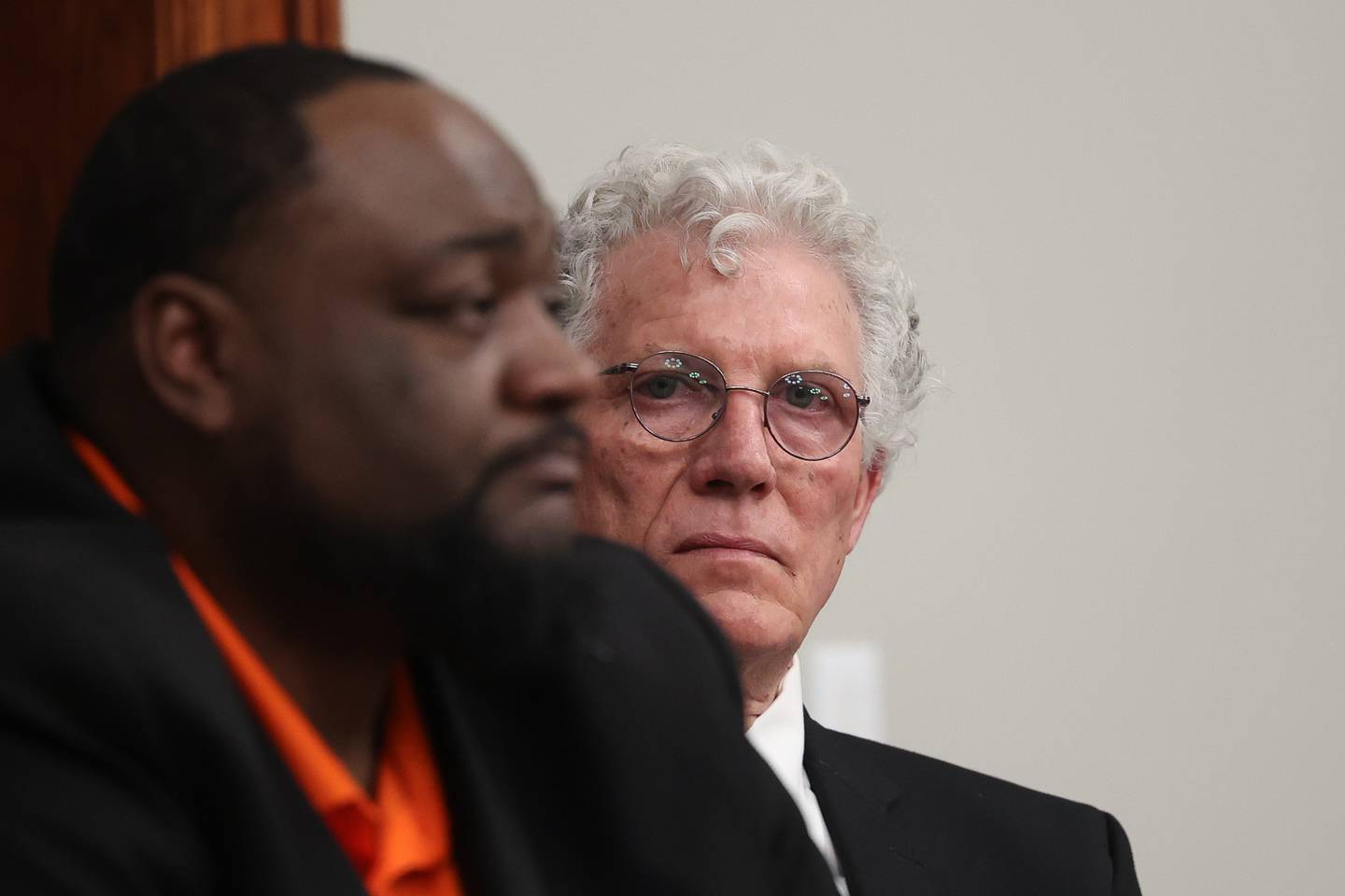 Candidate for Joliet City Council District 4 William Ferguson listens to Christopher Parker speak at a forum for the candidates at the Joliet Public Library on Thursday, March 9th, 2023 in Joliet.