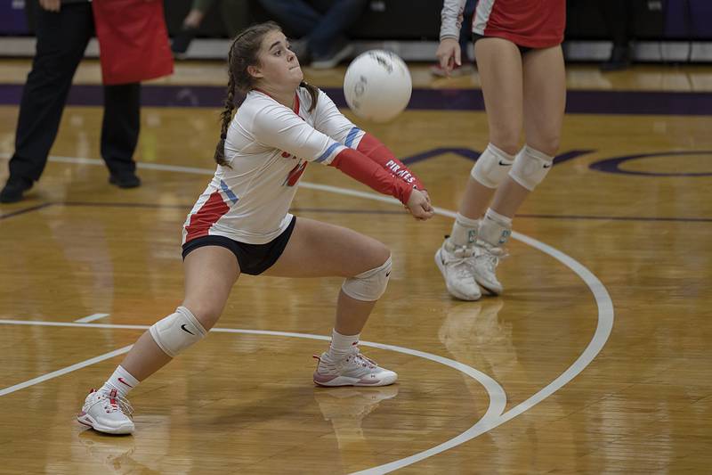 Ottawa’s Haley Waddell sends a pass forward during regionals against Dixon.