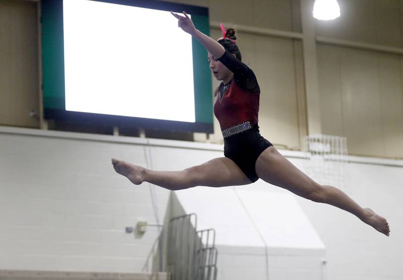 Prairie Ridge’s Maria Kakish competes on the balance beam Wednesday, Feb. 8, 2023, during  the IHSA Stevenson Gymnastics Sectional at Stevenson High School in Lincolnshire.