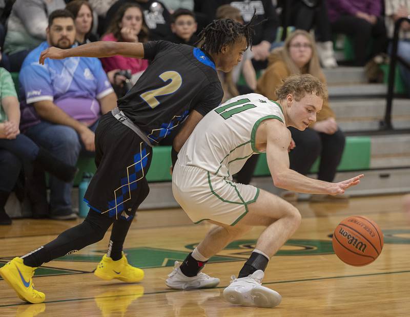 Rock Falls’ Gavin Sands gets the ball away from Rockford Christian’s Christian Cummings Tuesday, Jan. 30, 2024 at Rock Falls High School.