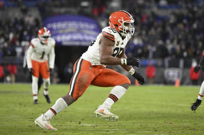 Cleveland Browns defensive end Myles Garrett (95) in action during the first half of an NFL football game against the Baltimore Ravens, Saturday, Jan. 4 2025, in Baltimore. (AP Photo/Terrance Williams)