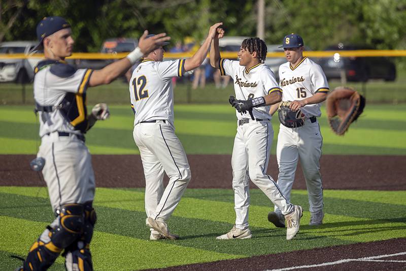 Sterling celebrates their 10-3 win over Rochelle Monday, May 20, 2024 the class 3A regional quarterfinal.