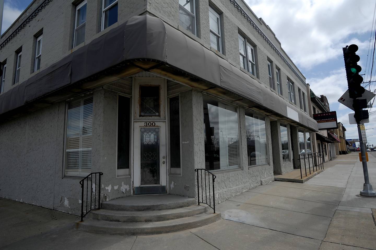 A three-story building with retail space and 80 apartments plus indoor and outdoor parking has been proposed to replace these buildings on Route 14 between Lincoln Avenue and Illinois Street in Fox River Grove.