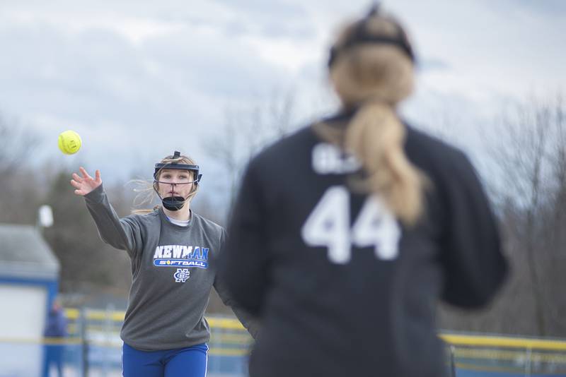 Newman's Macie Rosengren throws to first for an out Wednesday, April 6, 2022 against Bureau Valley.
