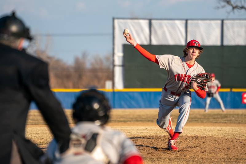 Yorkville's Carter Schaffner (22) delivers a pitch against Marmion during a baseball game at Marmion High School in Aurora on Tuesday, Mar 28, 2023.