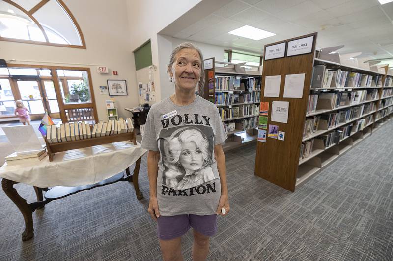 Mardi Ybarra, program coordinator for the United Way of Whiteside County, shows off her Dolly Parton shirt Wednesday, June 25, 2025, at the Odell Library in Morrison.