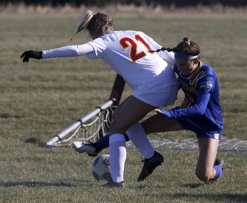 Richmond-Burton’s Blake Frericks battles with Johnsburg’s Elizabeth Smith for control of the ball during a Kishwaukee River Conference soccer game on Wednesday, March 20, 2024, at Johnsburg High School.