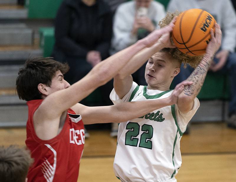 Rock Falls’ Nehemiah Menendez works against Oregon’s Jackson Caposey Friday, Jan. 10, 2025, at Rock Falls High School.