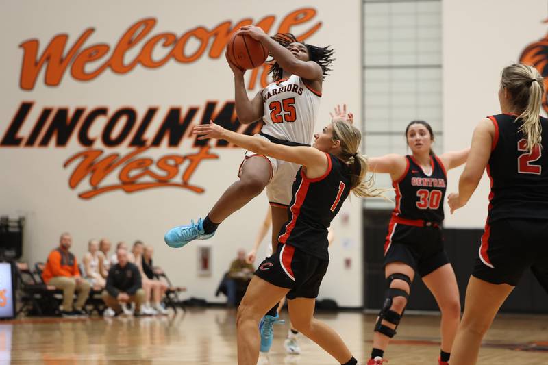 Lincoln-Way West’s Chyne Lewis goes in for the shot against Lincoln-Way Central on Tuesday, February 7th..