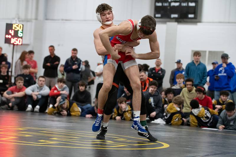 Sandwich's Cooper Corder, left, and Morrison's Caleb Modglin wrestle in the 150-pound championship match during the Reed-Custer Comet Classic Wrestling Invite on Saturday, Jan 17.