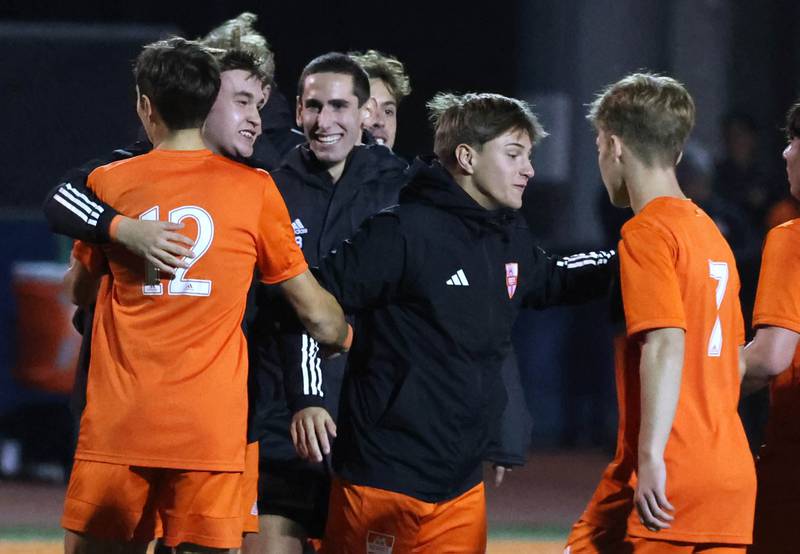Hersey players celebrate after winning a 1-0 game over Hinsdale Central Friday, Nov. 8, 2024, in the Class 3A state semifinal at Hoffman Estates High School.