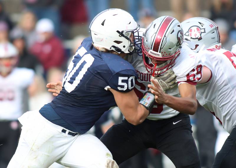Cary-Grove’s Ty Drayton blocks against Antioch in IHSA Class 6A second-round playoff football action on Saturday, Nov. 9, 2024, at Al Bohrer Field on the campus of Cary-Grove High School in Cary..
