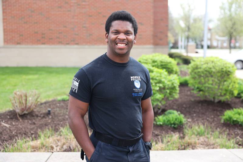 Morris Police Officer Justin Martin poses for a photo outside the Morris Police Department on Tuesday, April 16, 2024.