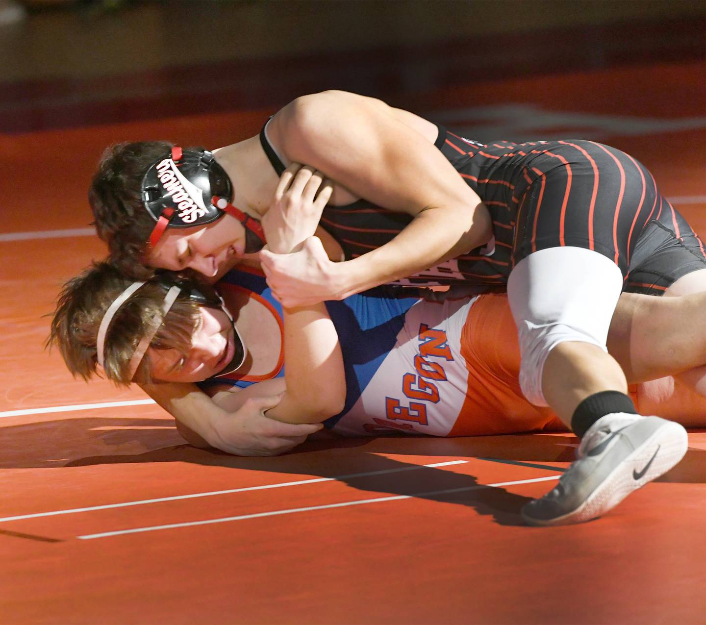 Oregon's Preston LeBay and Fulton's Broden Venhuizen wrestle in a Dec. 2 bout at the Blackhawk Center.