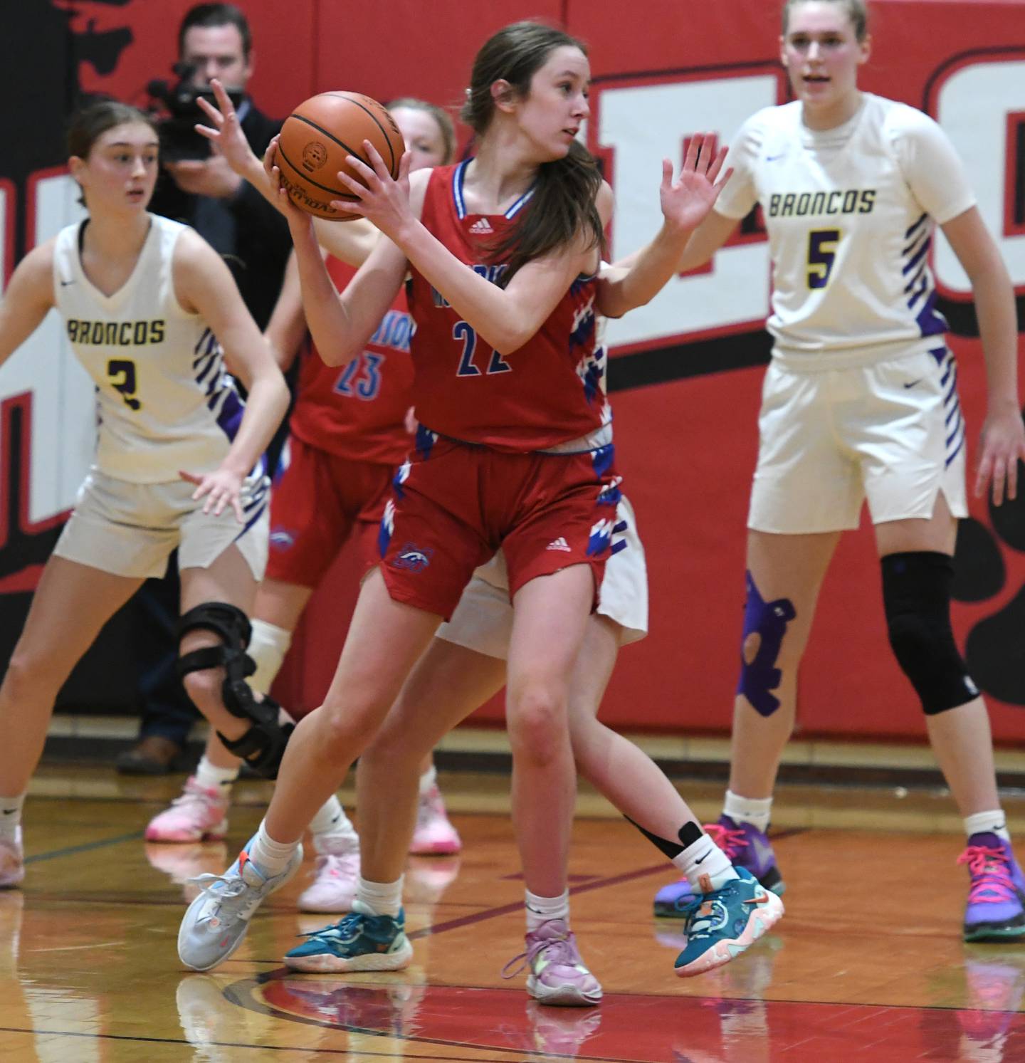 Morrison's Shelby Veltrop (22) looks to make a move to the basket against Orangeville during the championship game at the 1A Pearl City Regional on Friday.