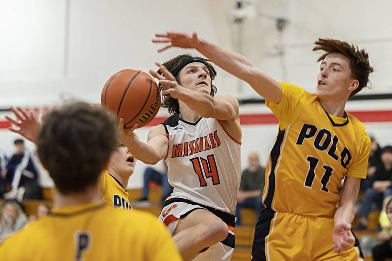 Milledgeville’s Kacen Johnson drives to the hoop Monday, Dec. 19, 2022 against Polo in the Forreston Holiday Tournament.