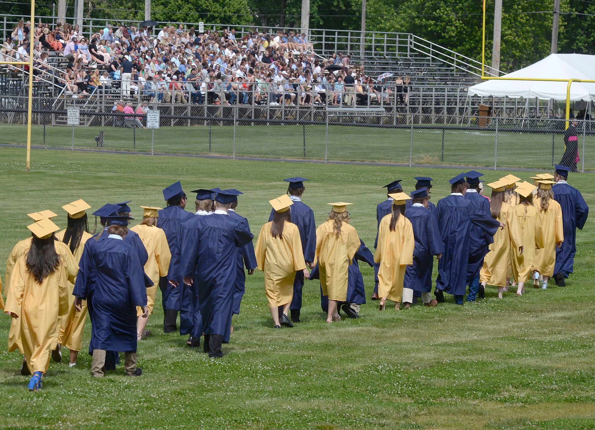 The Marquette Academy Class of 2023 enters Gould Stadium for the graduation ceremony Sunday, May 28, 2023.