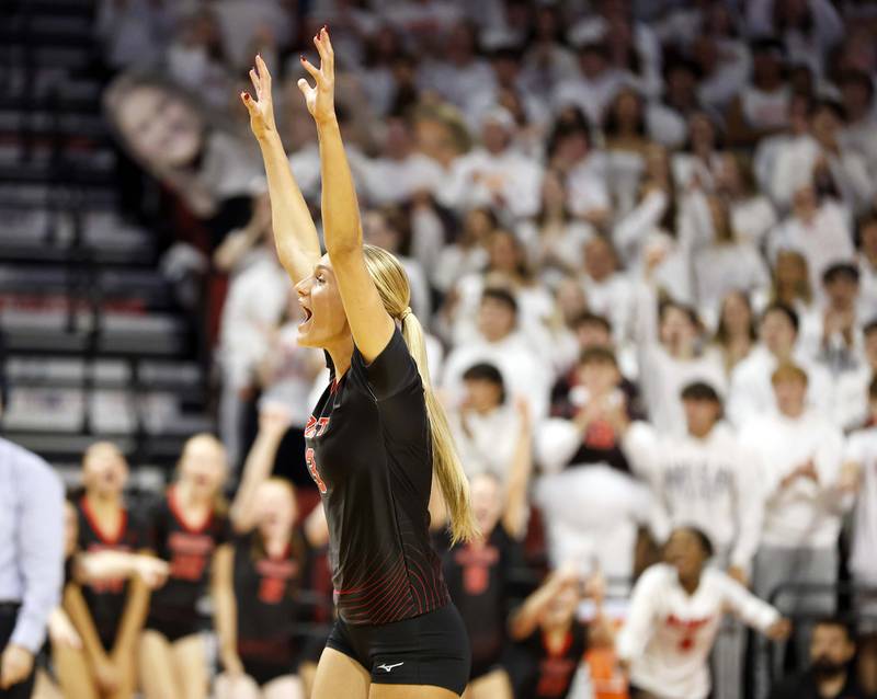 Benet Academy's Ava Ledebuhr (3) celebrates a point during the IHSA Class 4A girls volleyball championship match Saturday, Nov. 16, 2024 at CEFCU Arena in Normal.