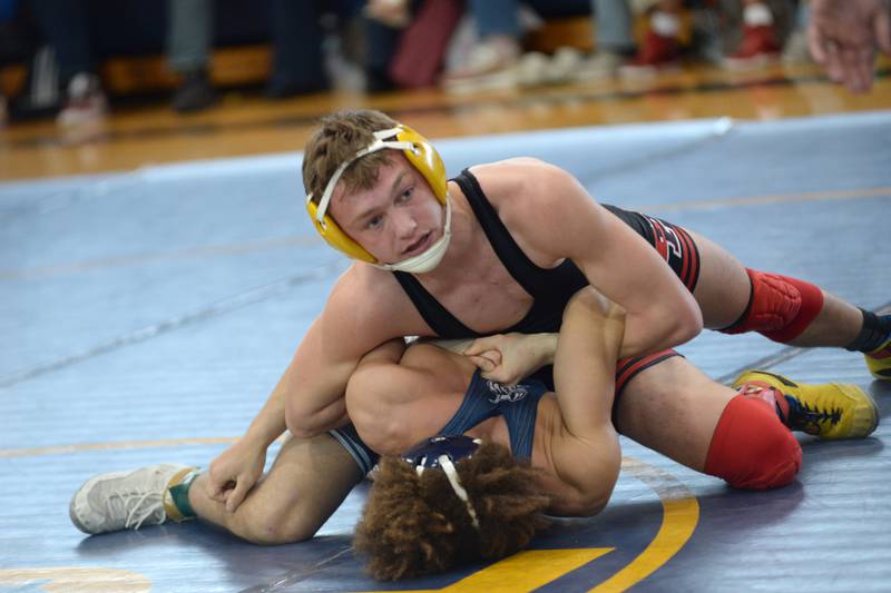 Erie-Prophetstown's Aidan Jepson holds an oppoent to the mat at the Polo Wrestling Invitational on Saturday, Jan. 11, 2025 at Polo High School. He finished first in his weight class.