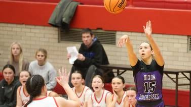 Dixon rattles off 33-1 run, bests Ottawa by 18 at Kingman Gym