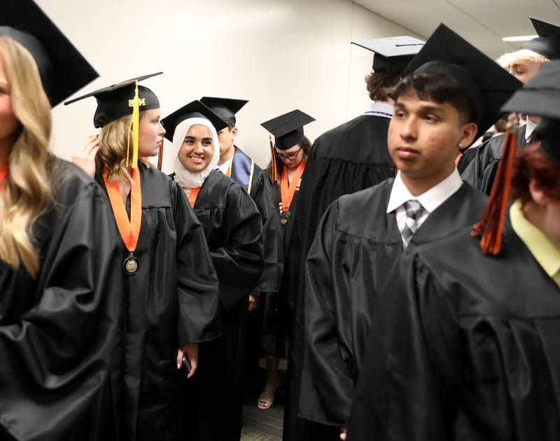 Wheaton Warrenville South graduates line up for the school’s 2022 Commencement Ceremony at the College of DuPage in Glen Ellyn on Saturday, May 28, 2022.