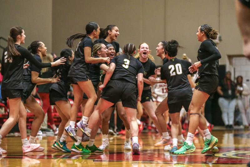 Waubonsie Valley's celebrates the win over Benet in their Class 4A Bolingbrook Sectional final basketball game between Waubonsie Valley at Benet. Feb 27, 2025 in Bolingbrook.