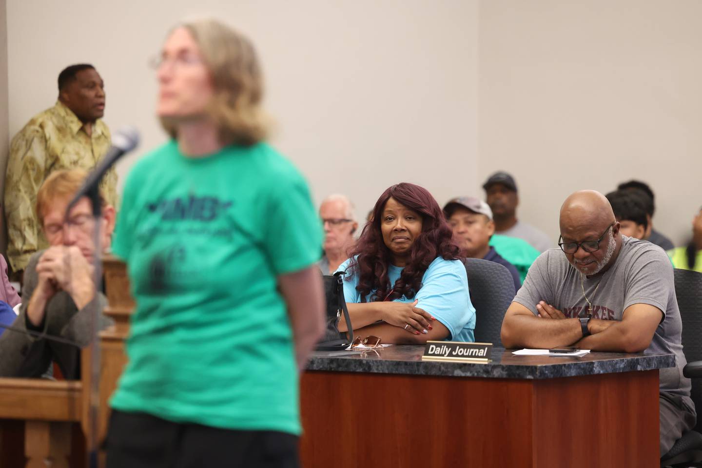 First Ward Alderpersons Michael Prude, right, and Cherry Malone Marshall listen as a Fortitude Community Outreach supporter speaks at the Kankakee Planning Board meeting on Aug. 19, 2025. The board voted 5-0 to approve a conditional use permit to allow a night shelter at 970 E. Court St. in Kankakee's 1st Ward. Both alderpersons voiced their opposition to the final approval, which will go before the city council in September.
