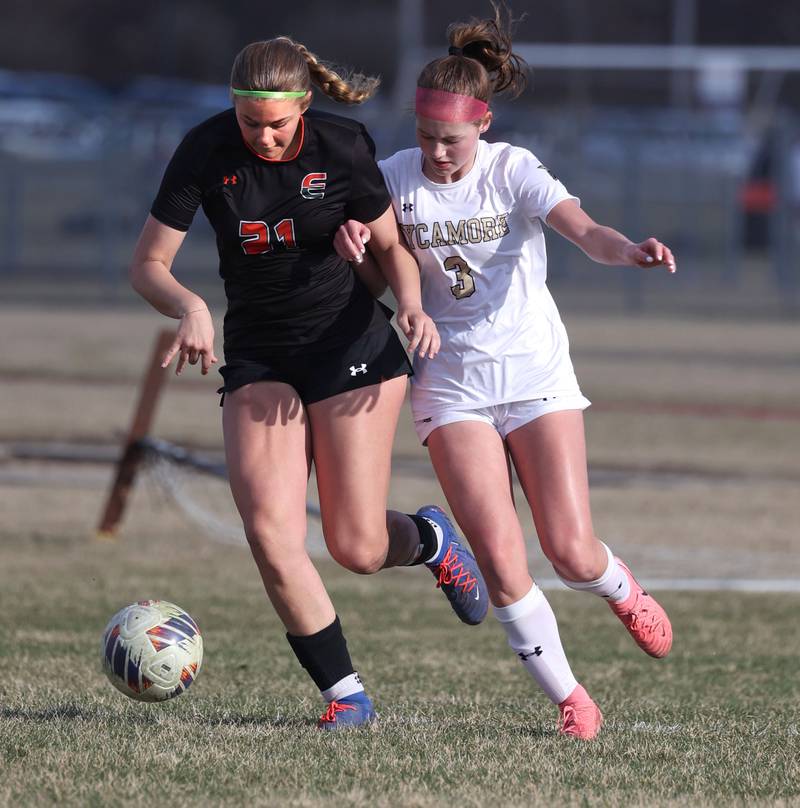 Plainfield East's Corinne Bullock (left) and Sycamore's Marin Gautcher battle for a ball during their game Tuesday, March 25, 2025, in the Barb Fest tournament at DeKalb High School.