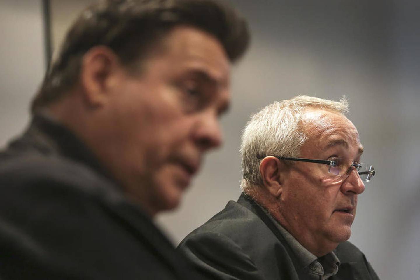 Will County Board members Steve Balich (left) and Mike Fricilone (right) field questions from local residents on Sept. 30 at Coom's Corner in Lockport.