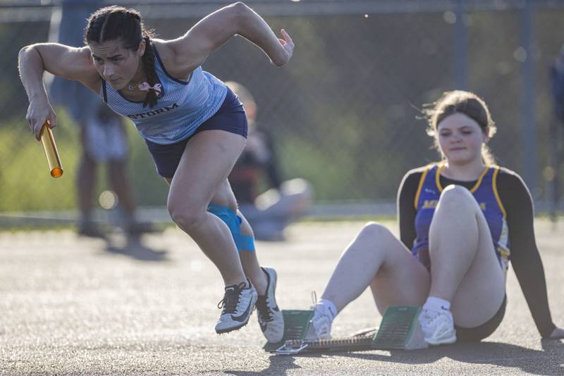 Connie Gibson of Bureau Valley High School leaves the starting block during the girls 4x100 meters heat at Mendota High School on May 3, 2024.