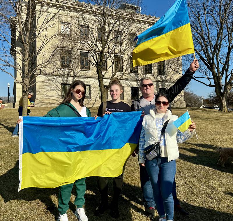 Ukrainians Viktoriia Vasilkova, Anna Skubchenko, Olya Didenko and Mykhailo Orieshkin show their support for Ukraine during a vigil in Dixon on March 13, 2025.