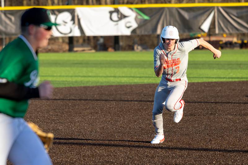 Lucas Farabaugh of Ottawa runs towards the third base on Monday, March 17, 2025 at Seneca High School in Seneca.