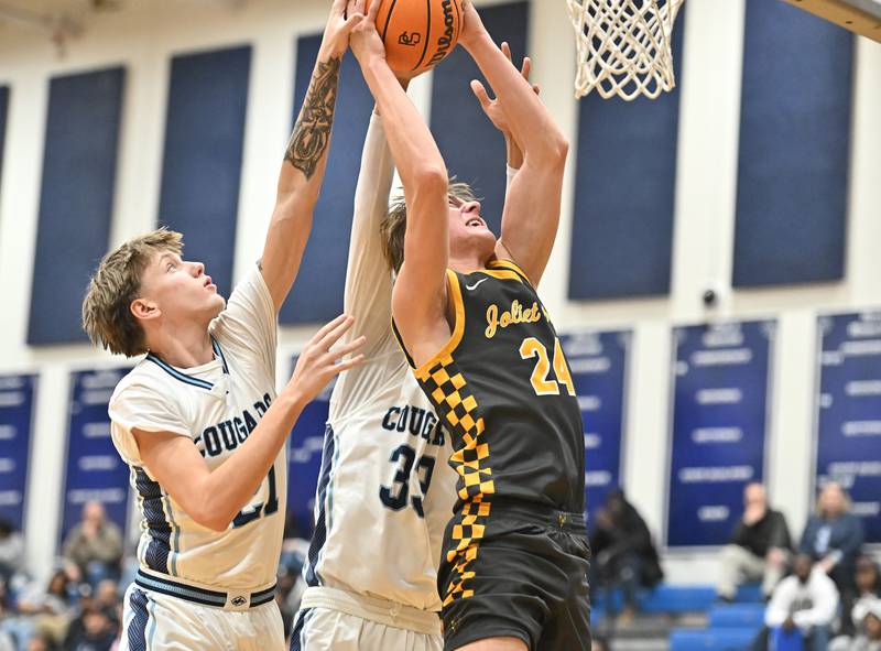 Joliet West's Ryan Lipke goes up strong for a shot during the conference game against Plainfield South on Friday, DEC. 05, 2025, at Plainfield.