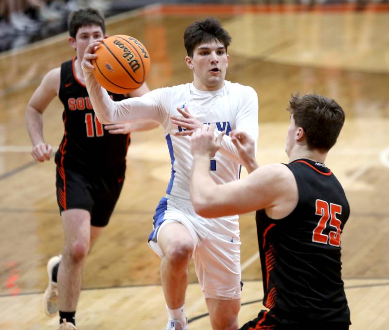 Geneva’s Gabe Jensen tries to get past Wheaton Warrenville South's Brady Goken during a Class 4A St. Charles East Sectional semifinal against on Wednesday, March 5, 2025 in St. Charles.