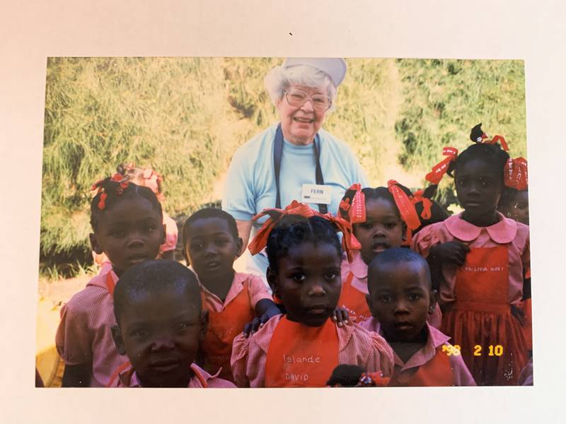 For decades, Sterling teacher Fern Shore (center) donated what she could to Hope for Haitians to build homes in that country, The organization announced Wednesday, Aug. 20, 2025, that Shore, prior to her death last fall, bequeathed 741 shares of McDonald's stock to the organization. The gift came in at $220,000. This photo shows Shore during a trip to Haiti.