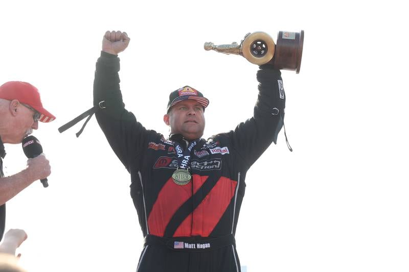 Matt Hagan celebrates winning the Funny Car championship race at the NHRA’s Gerber Collision and Glass Route 66 Nationals at Route 66 Raceway on Sunday, May 19, 2024 in Joliet.