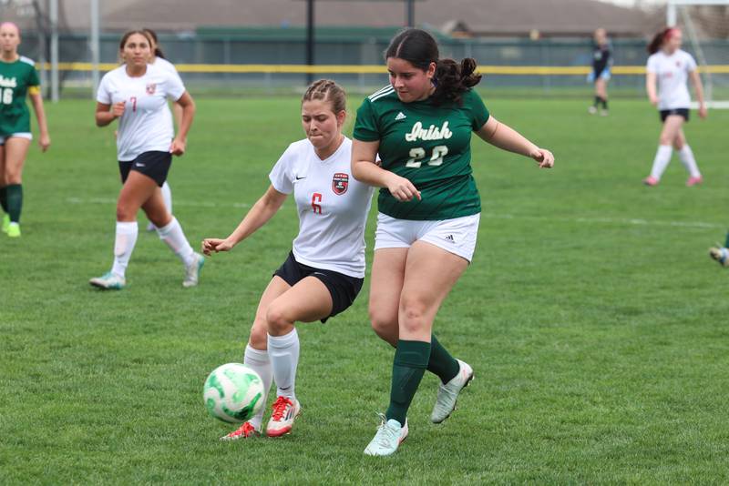 Bradley-Bourbonnais' Lilly Argyelan, left, and Bishop McNamara's Gloria Morocho Loja fight for possession during the Boilermakers' 9-1 win over Bishop McNamara in All-City play on Tuesday, March 31, 2026.