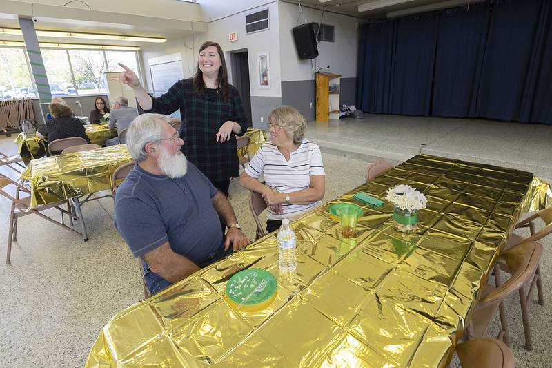 Rock Falls Chamber of Commerce President Bethany Bland speaks with friends Joe and Pat Baldwin Thursday, May 4, 2023 during a going away party for Bland. Bethany’s last day will be Friday, March 5, 2023.