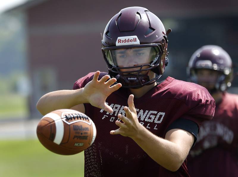 Marengo's Sam Vandello catches a snap during football practice on Tuesday, July 22,  2025, at Marengo High School.