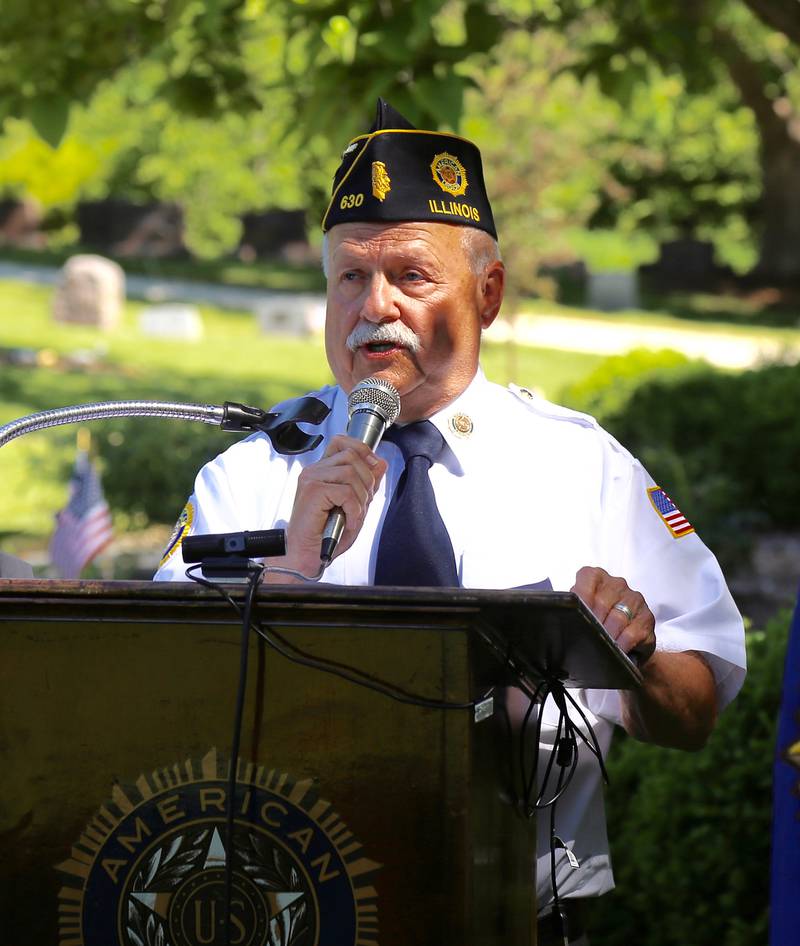 Norm Welker from the Elburn American Legion Post 630 opens the Memorial Day ceremony on Monday, May 29, 2023 at Blackberry Township Cemetery in Elburn.
