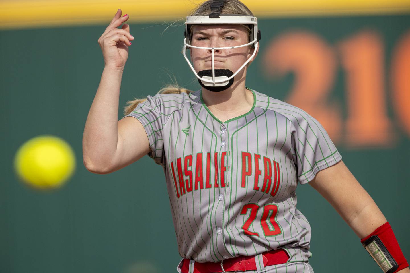 LaSalle Peru High School's Taylor Vescogni hurls a strike against a Kaneland High School batter during the game on April 28, 2025 at the LaSalle Peru High School Sports Complex.