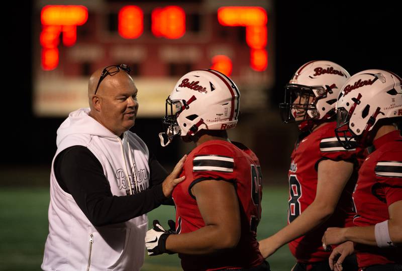 Bradley-Bourbonnais' head coach Mike Kohl talks with players in a game against T.F. North on Friday, August 29, 2025.
