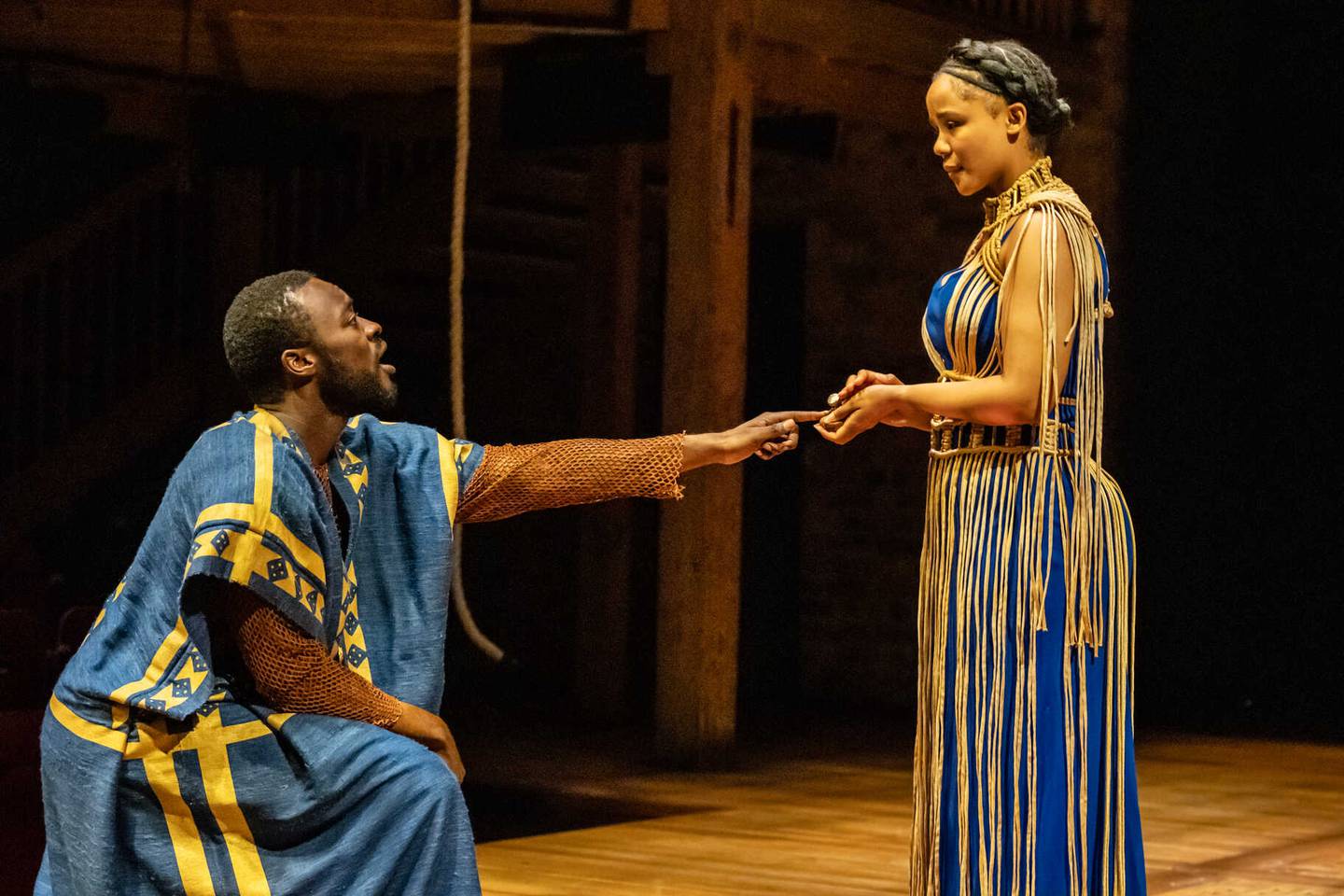 Kel Matsena as Lysimachus and Rachelle Diedericks as Marina in the
Royal Shakespeare Company’s Pericles. Directed by RSC co-artistic director
Tamara Harvey and running in Chicago Shakespeare’s Courtyard Theater October
20-December 7, 2024. Photo by Johan Persson.