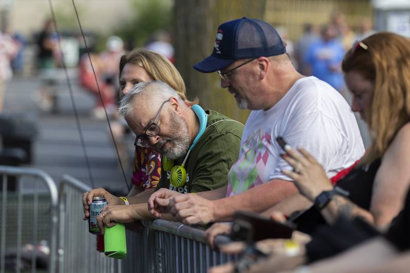 Fans of The Smoking Popes jam out Thursday, July 3, 2025, as the Chicago area band takes the main stage at Petunia Fest in Dixon.
