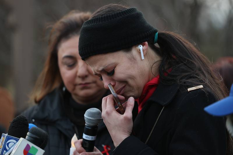 Teresa Martin, who helped organize the evening, has an emotional moment while sharing at the candlelight vigil for the victims of the March 5th shooting on Wednesday, March 8th, 2023 in Bolingbrook.