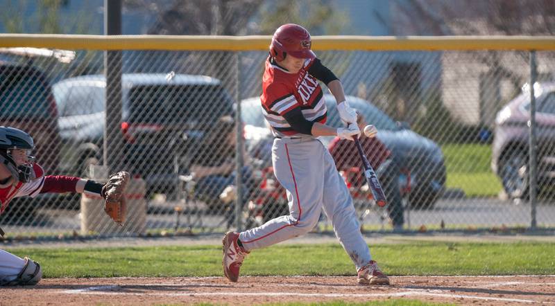 Yorkville's Gavin Dobbels (3) doubles driving in a run against Plainfield North during a baseball game at Plainfield North High School on Thursday, April 21, 2022.